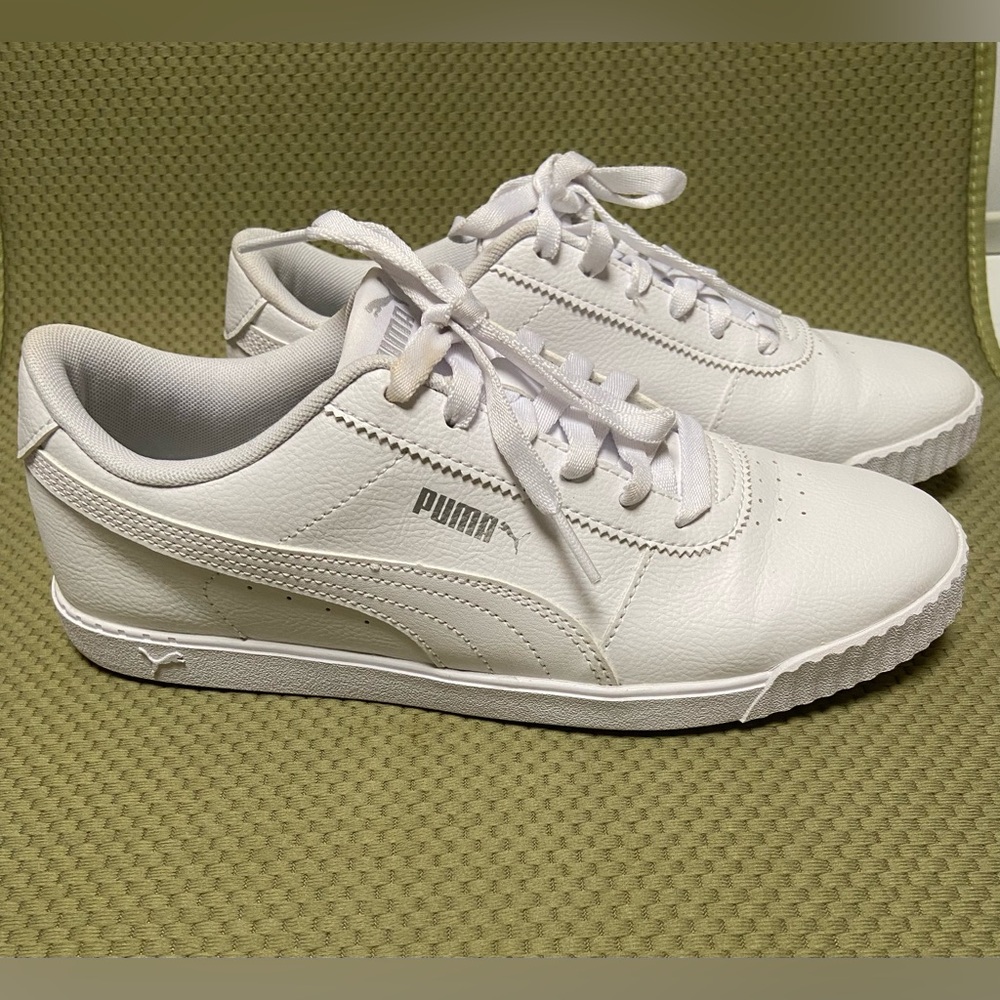 Puma leather tennis shoes. Women’s 8:5 White. Like new. Worn once.